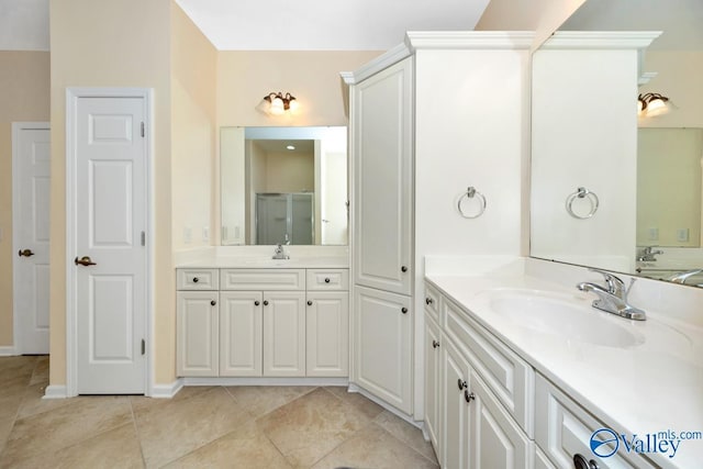 77 Valley Way Cir SE Unit 77, Huntsville, AL 35802 - full bath with vanity, tile patterned flooring, a shower with door, and baseboards