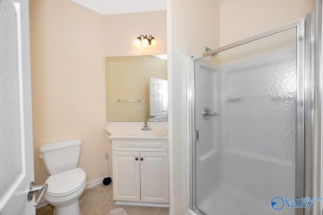 77 Valley Way Cir SE Unit 77, Huntsville, AL 35802 - full bathroom with a stall shower, vanity, toilet, tile patterned floors, and baseboards