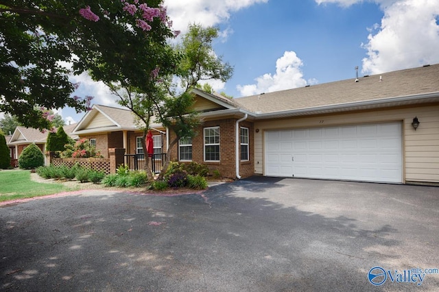 77 Valley Way Cir SE Unit 77, Huntsville, AL 35802 - ranch-style house with driveway, brick siding, and a garage