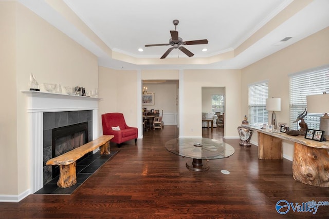 77 Valley Way Cir SE Unit 77, Huntsville, AL 35802 - living room with wood finished floors, a tile fireplace, a ceiling fan, recessed lighting, and a raised ceiling