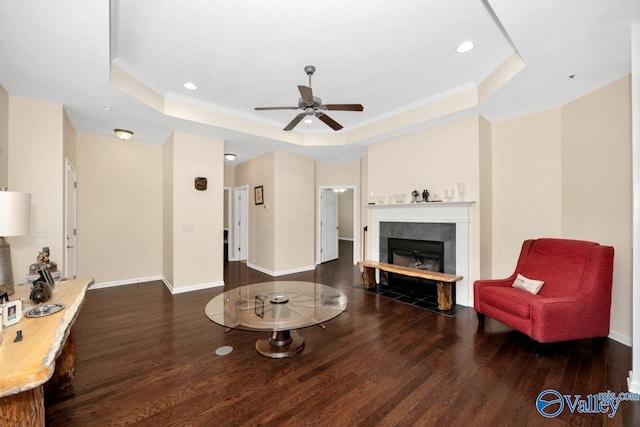 77 Valley Way Cir SE Unit 77, Huntsville, AL 35802 - living area featuring a tray ceiling, wood finished floors, ornamental molding, a tile fireplace, and recessed lighting