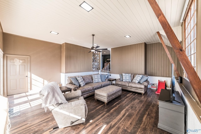 living room with dark wood-type flooring and ceiling fan