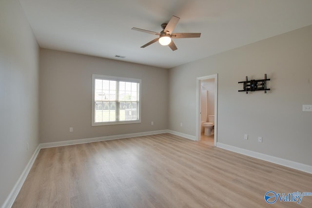 spare room with ceiling fan and light hardwood / wood-style floors