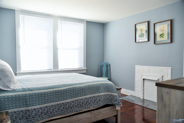 bedroom featuring dark wood-type flooring