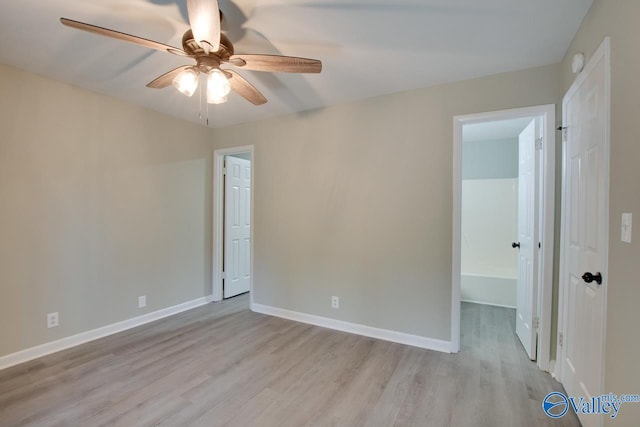 unfurnished bedroom with light wood-type flooring and ceiling fan