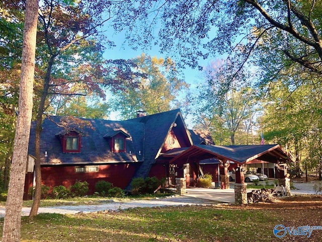 view of front of home featuring a carport