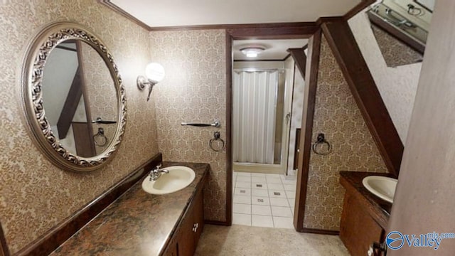 bathroom featuring tile patterned floors, vanity, and ornamental molding