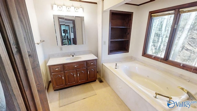 bathroom with a tub to relax in and vanity