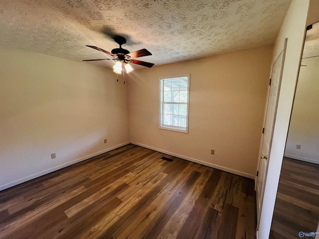 781 Lloyd Rd, Wellington, AL 36279 - interior space featuring ceiling fan, a textured ceiling, visible vents, baseboards, and dark wood-type flooring