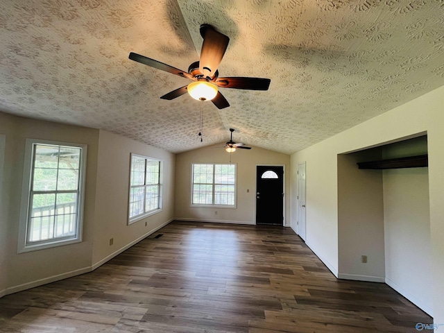 781 Lloyd Rd, Wellington, AL 36279 - unfurnished living room with ceiling fan, dark wood-type flooring, a textured ceiling, and lofted ceiling