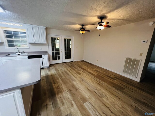 781 Lloyd Rd, Wellington, AL 36279 - interior space with a textured ceiling, a sink, visible vents, and french doors