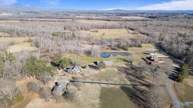 aerial view with a water view and a rural view