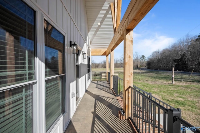 balcony featuring a rural view