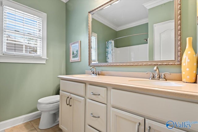 full bathroom featuring toilet, crown molding, a sink, and tile patterned floors