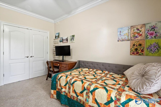 carpeted bedroom with a closet and ornamental molding