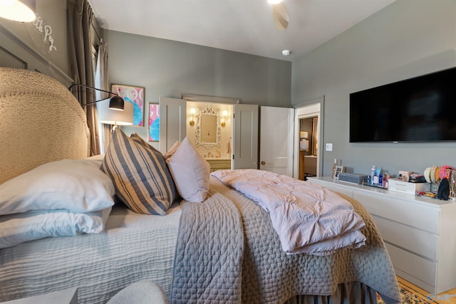 bedroom featuring ceiling fan and connected bathroom