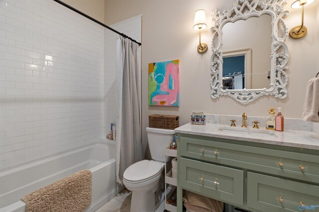 full bathroom with shower / tub combo, toilet, and vanity