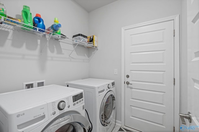 302 Shangrila Way, Meridianville, AL 35759 - washroom with washing machine and clothes dryer and baseboards
