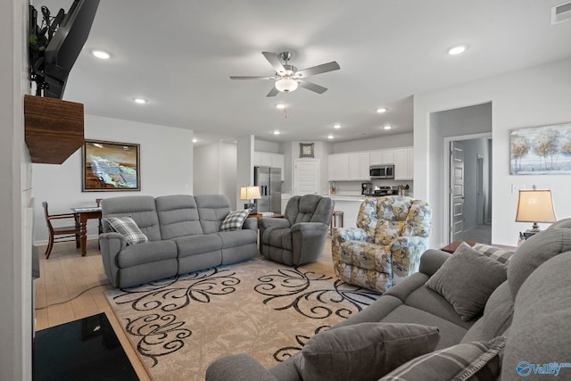 302 Shangrila Way, Meridianville, AL 35759 - living room with light wood finished floors, ceiling fan, recessed lighting, and baseboards