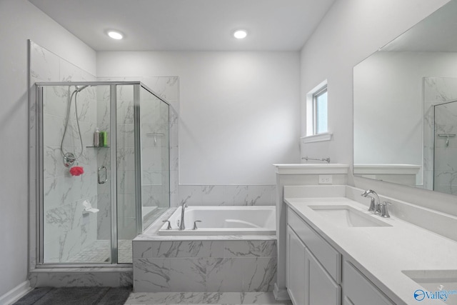302 Shangrila Way, Meridianville, AL 35759 - bathroom featuring a bath, a marble finish shower, and double vanity