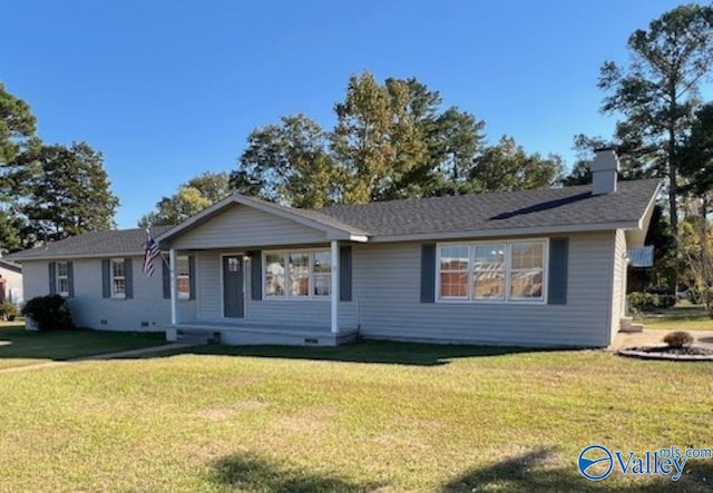 ranch-style house with a front lawn