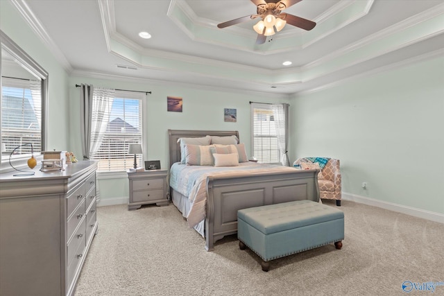 carpeted bedroom with ceiling fan, ornamental molding, and multiple windows