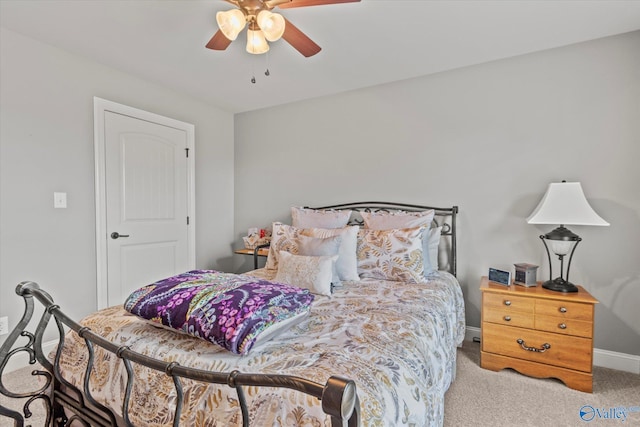 bedroom with light carpet and ceiling fan