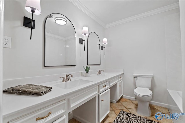 bathroom with ornamental molding, a sink, toilet, and double vanity