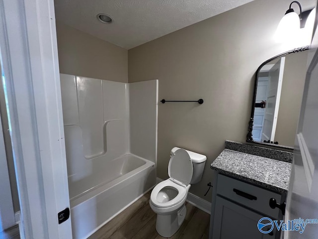 100 James Bowie Dr, Athens, AL 35611 - bathroom with wood finished floors, vanity, toilet, and baseboards