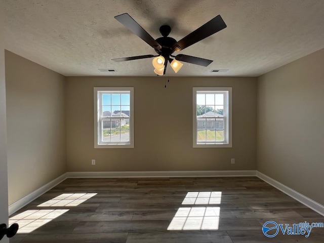 100 James Bowie Dr, Athens, AL 35611 - spare room with wood finished floors, baseboards, ceiling fan, and a textured ceiling