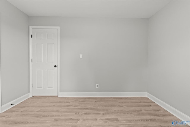 unfurnished room featuring light wood-type flooring