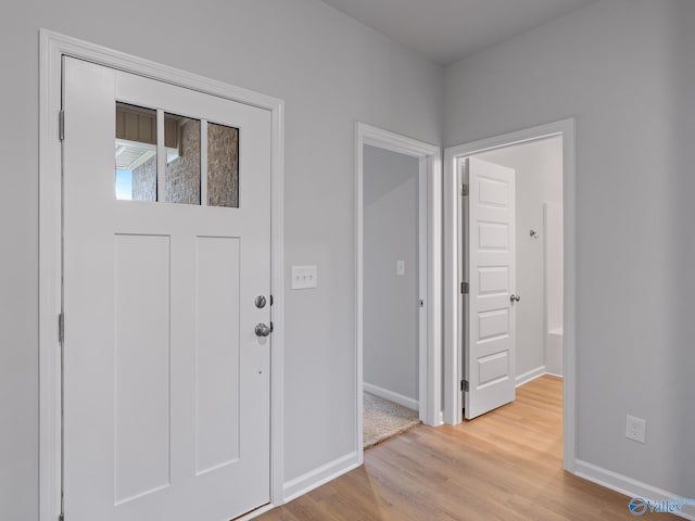 foyer entrance featuring light hardwood / wood-style floors