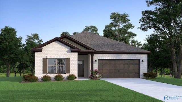 view of front of home featuring a garage and a front lawn