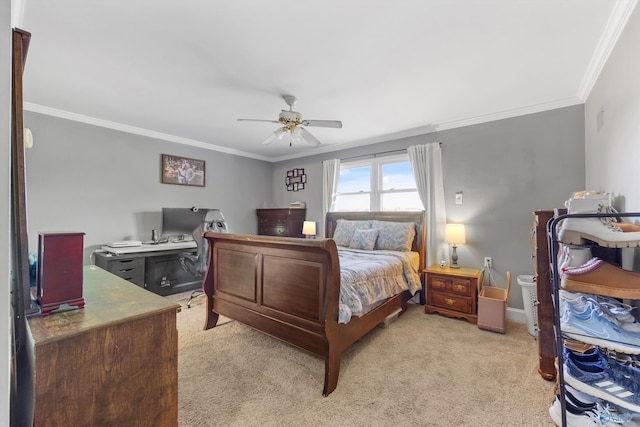 bedroom featuring ornamental molding, ceiling fan, light carpet, and baseboards
