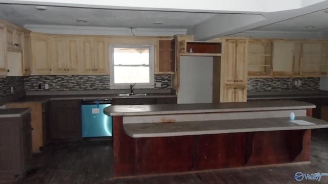 kitchen featuring light brown cabinetry, sink, tasteful backsplash, dishwashing machine, and a kitchen island