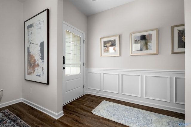 entryway with dark wood-type flooring