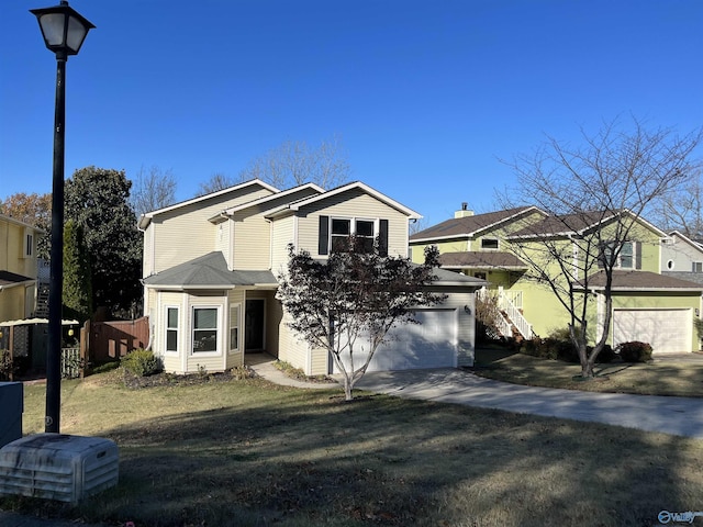 view of front facade featuring a garage and a front yard