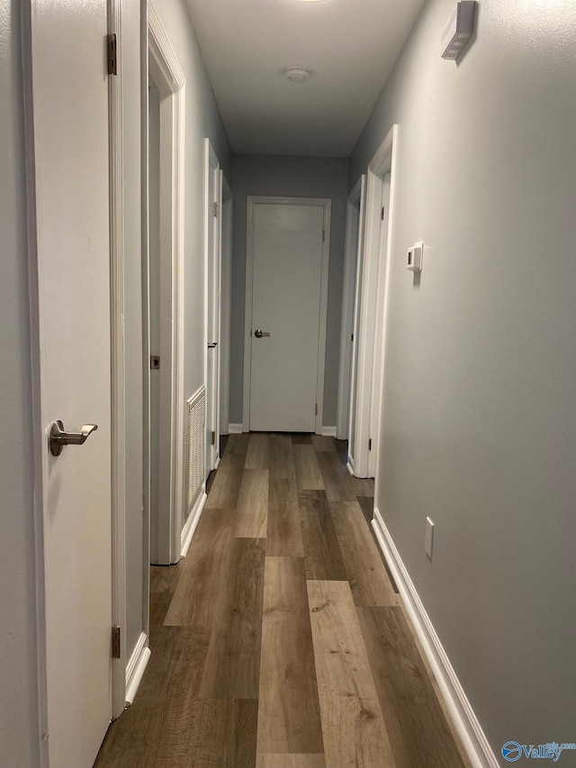 hall featuring dark hardwood / wood-style floors