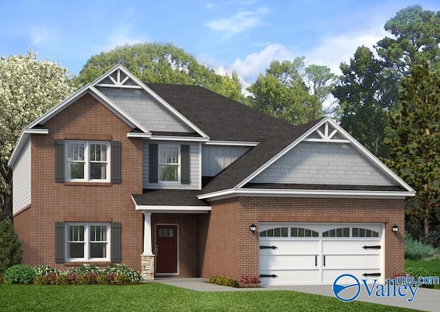 craftsman-style home featuring a garage and a front yard