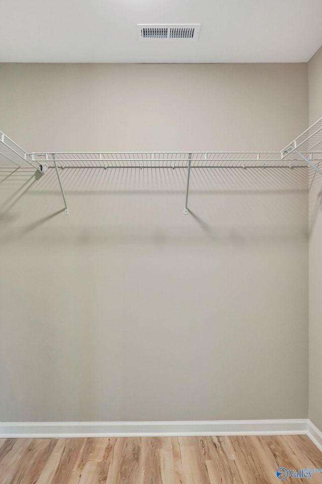 spacious closet with visible vents and light wood finished floors