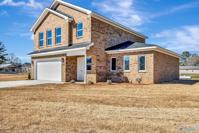 traditional home featuring brick siding, an attached garage, concrete driveway, and a front lawn