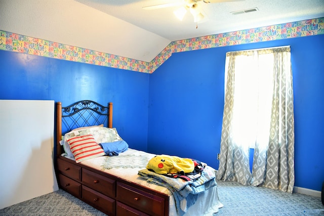 bedroom featuring vaulted ceiling, ceiling fan, and light colored carpet