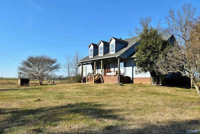 view of front of home with a front lawn and a porch