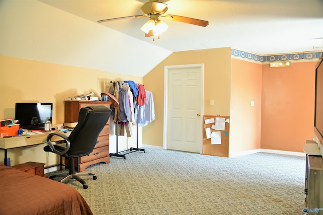 office area with ceiling fan, vaulted ceiling, and carpet flooring