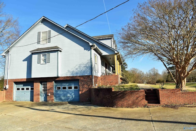 view of home's exterior with a garage