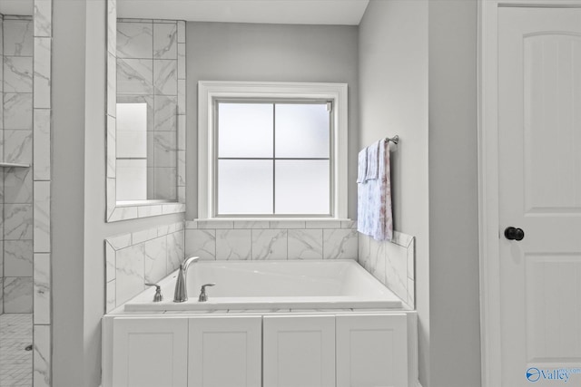 bathroom featuring shower with separate bathtub