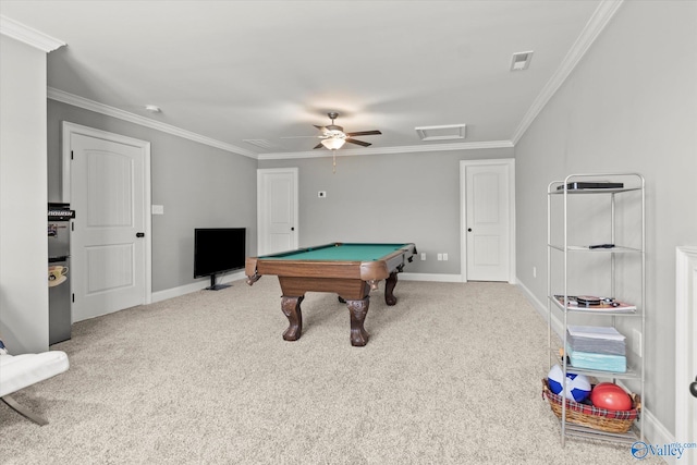 rec room with pool table, ornamental molding, ceiling fan, and light carpet