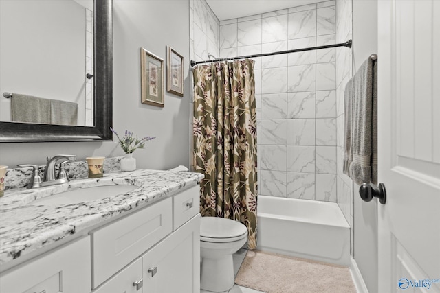 full bathroom featuring shower / tub combo with curtain, vanity, and toilet