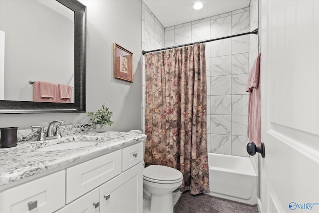 full bathroom featuring shower / tub combo, vanity, and toilet