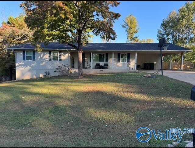 single story home with a carport and a front yard